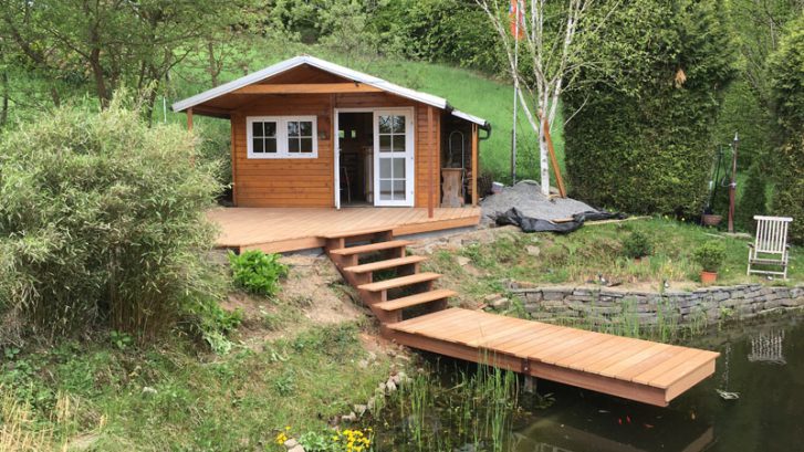 Hochwertiger Terrassenbau mit Holz, Naturstein, Betonpflasterstein und WPC